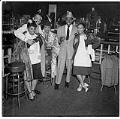 Image of Group near bar at Black & Tan nightclub, Seattle, circa 1945