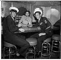 Image of Two servicemen sitting at a bar, Seattle, circa 1945