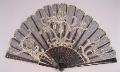 Image of Black net fan with design in white lace, ca. 1890-1910
