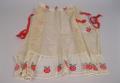 Image of Tea apron with apple stitched design, ca. 1910