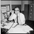 Image of Wesley Tao in his office, Seattle, July 1965