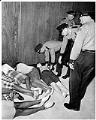 Image of Police removing demonstrators at City Hall, Seattle, July 25, 1963