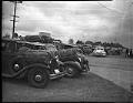 Image of Cars packed with belongings during forced removal of Japanese Americans,  Bainbridge Island, March 1942