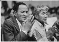 Image of Hay Srey and Voeuk Soth praying for fellow Cambodians, Seattle, January 6, 1985