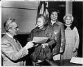 Image of Three Chinese women receiving citizenship papers, February 10, 1979