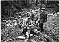 Image of Thongdy family members clearing land for family farm, April 12, 1982