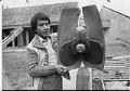 Image of Lawney Reyes with cedar bald eagle sculpture, Seattle, September 26, 1977
