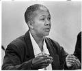 Image of Millie Russell speaking at hearing on discrimination in schools , February 18, 1986
