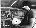 Image of Alex Williams carving mask at Daybreak Star Cultural Center, Seattle, April 13, 1978