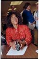 Image of Re'Gena Bell filing paperwork as City Council candidate, Seattle, July 26, 1993