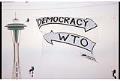 Image of Rainforest Action Network WTO protest banner, Seattle, November 29, 1999