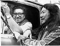 Image of Bernie Whitebear receiving lumber delivered by Bill Boyd, Seattle, November 10, 1974