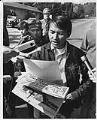 Image of Bernie Whitebear reading proclamation ending protester's encampment at Fort Lawton, Seattle, April 3, 1970
