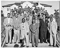 Image of Members of the Royal Esquire Club on steps of Collins Field House, Seattle, September 11, 1949