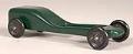 Image of Sleek and sporty green pinewood derby car, one of four, made by Jim Smith, ca. 1995-2010