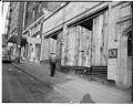 Image of Boarded up storefronts on 6th Ave. S  after forced removal of Japanese Americans, Seattle, June 1942