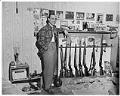 Image of Joe Smith with his gun collection, circa 1948