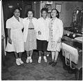 Image of Four women, possibly staff from the Basin Street Club, circa 1943