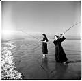Image of Seattle-area nuns fishing on beach at Grayland, WA, August 1960