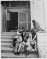 Image of Women and children on steps of Beacon Hill School during occupation, October 1972
