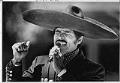 Image of Felipe Villaverde singing during Cinco de Mayo celebration at South Seattle Community College, May 5, 1981