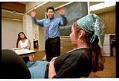 Image of Guy Kurose speaking to Trisha and Monique Hendrix, Seattle, August 1993