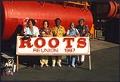 Image of Group with ROOTS Reunion sign, Seattle, 1987