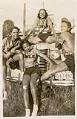 Image of Four Owls Club softball players on car, Seattle circa 1938
