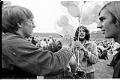 Image of Young men with helium balloons at Jimi Hendrix concert, Seattle, July 26, 1970