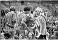 Image of Fan talking to soda vendor at Jimi Hendrix concert, Seattle, July 26, 1970
