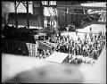 Image of Striking longshoremen with locomotive leaving Smith Cove, Seattle, July 19, 1934