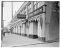 Image of Boarded up window displays on Jackson Street after forced removal of Japanese Americans, Seattle, 1942
