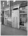 Image of Boarded up storefronts in Chinatown - International District after forced removal of Japanese Americans, Seattle, June 1942
