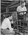 Image of Glen Alps & Edwin Essex with model for City Hall fountain, Seattle, September 1961