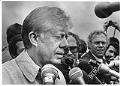 Image of Jimmy Carter speaking to media after viewing Mt. St. Helens eruption zone, Kelso, May 22, 1980