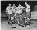 Image of Seattle Ironmen players on the ice, March 1950
