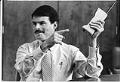 Image of Craig McCaw holding cell phone, September 1986