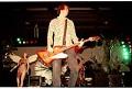 Image of Krist Novoselic on stage during Nirvana concert, Seattle Center Arena, January 7, 1994