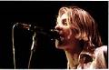 Image of Kurt Cobain on stage during Nirvana concert, Seattle Center Arena, January 7, 1994