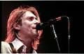 Image of Kurt Cobain on stage during Nirvana concert, Seattle Center Arena, January 7, 1994