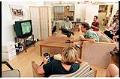 Image of Bill Nye with others watching an episode of his show, Seattle, July 15, 1996