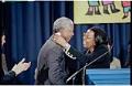 Image of Nelson Mandela and Graça Machel at welcoming ceremony at Boeing Field, Seattle, December 8, 1999
