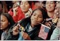 Image of Shyidah Salahud'din trying to take a picture at Nelson Mandela welcoming ceremony, December 8, 1999