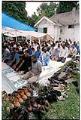 Image of Men sitting during worship at the Masjid Al-Salaam, SeaTac, August 3, 2001