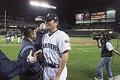 Image of Mariners pitcher Kazuhiro Sasaki being congratulated after 116th win, Safeco Field, Seattle, October 6, 2001