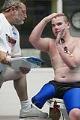 Image of Justin Fleming talking with Stan Morris after practice swim, Federal Way, June 12, 2002