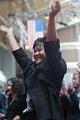 Image of Ying Shen Winkle after being sworn in as a new citizen at Seattle Center, July 4, 2002