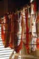 Image of Strips of steelhead hanging in drying shed, July 26, 2002