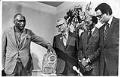 Image of James Washington Jr. presenting sculpture 