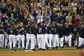 Image of Ichiro Suzuki with teammates after breaking record for most hits in a season, Safeco Field, Seattle, October 1, 2004